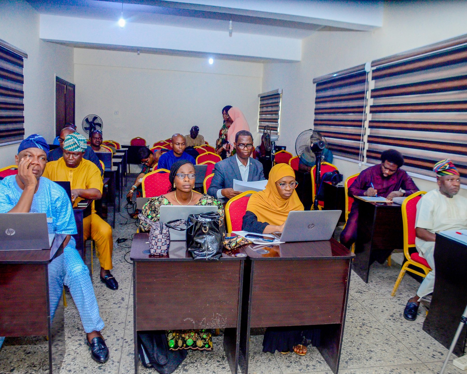 Participants working on laptops during GICSRD’s postgraduate research training